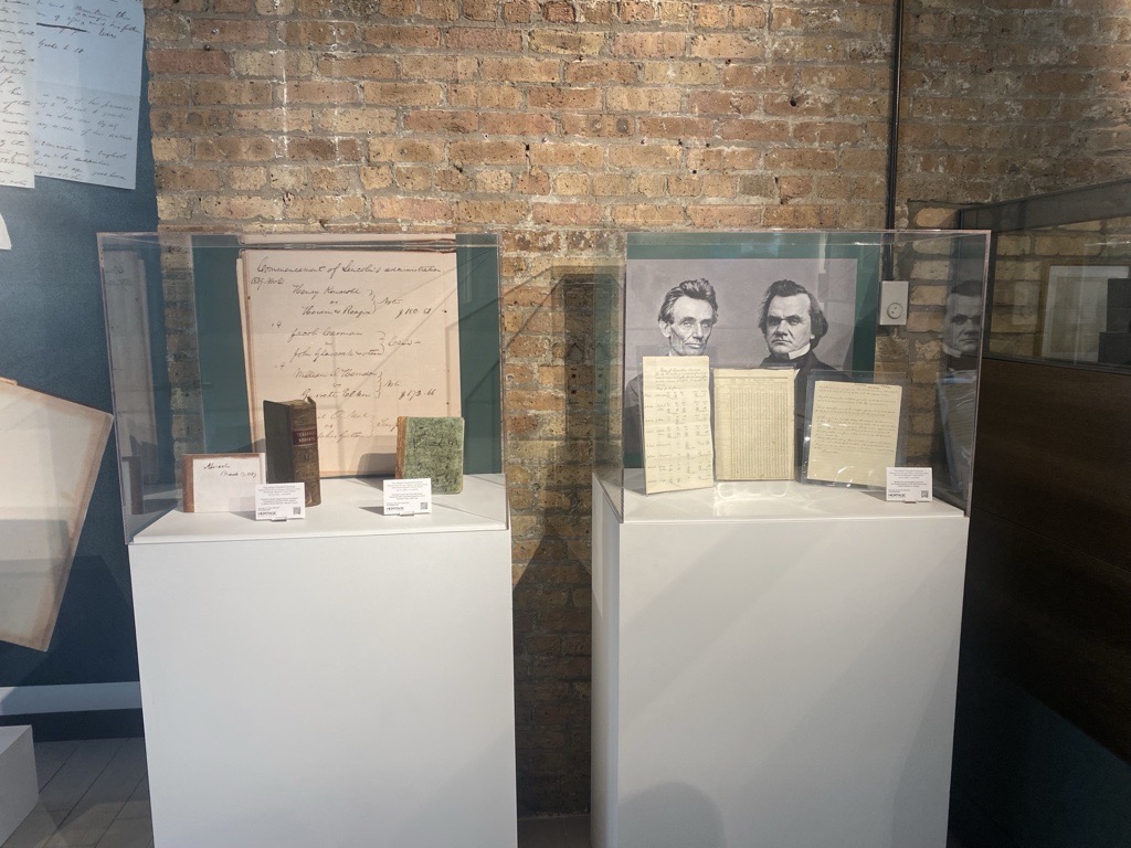 Important documents signed and written by Abraham Lincoln including a fee book f